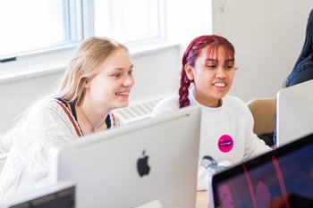 Young girls working on computers