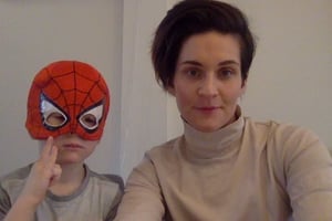 Heather and her son in a Spiderman mask